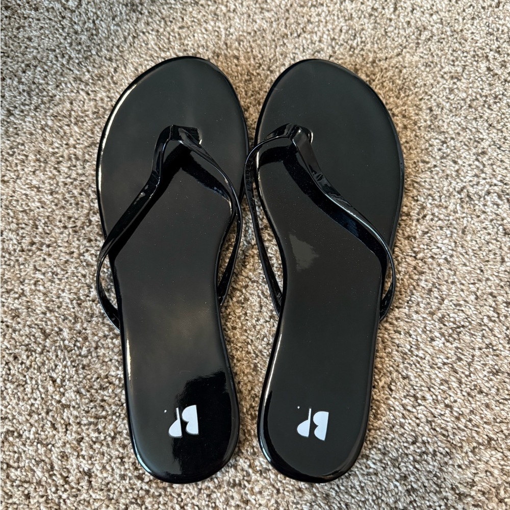 BP black flip flops